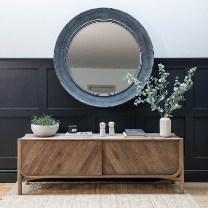 Scandi-inspired sideboard unit with space-saving sliding doors and wood finish