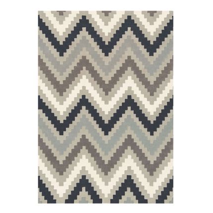 Hand-tufted wool rug with chevron pattern in natural light brown