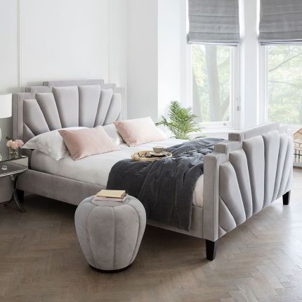 Lifestyle of art-deco inspired bed frame in grey velvet upholstery