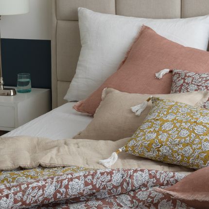 Lovely linen cushion with natural finish and fringed edges