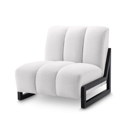 A luxurious and chic white Lando chair with black angular, wooden legs
