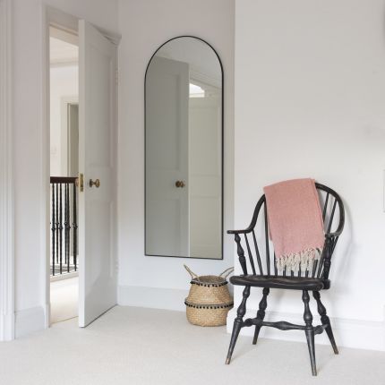 Classic, minimal arch mirror with beautiful black frame