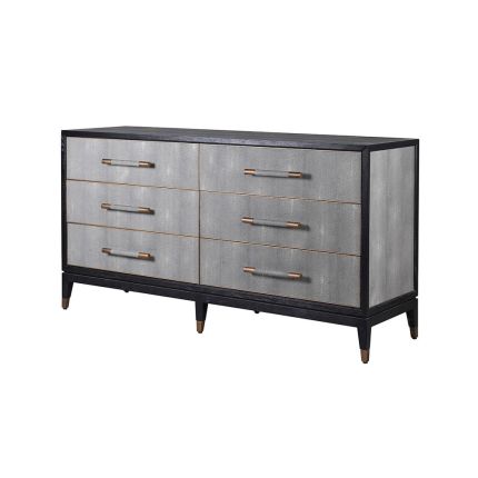 An elegant faux shagreen six-drawer chest with black and brass accents 