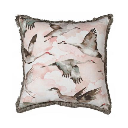 A luxurious cushion with cranes and pink clouds filled with duck feathers