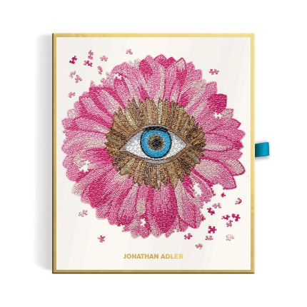 A luxury petals shaped puzzle by Jonathan Adler with 750 pieces and glamorous gold foil accents