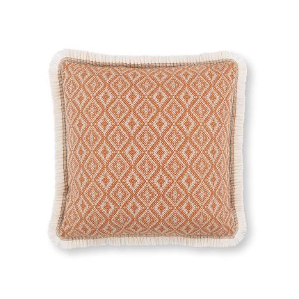 An orange outdoor cushion with diamond pattern and fringe details.
