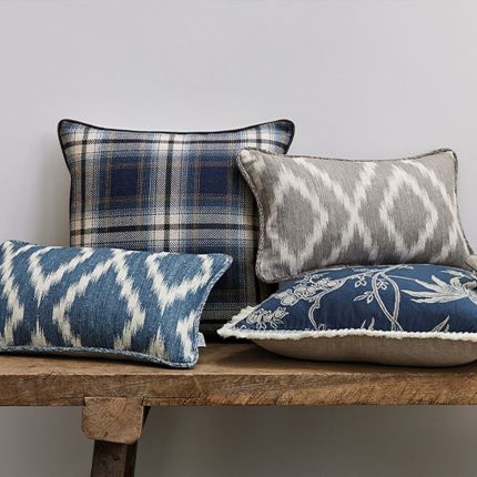 A gorgeous cushion by Romo with a gentle geometric pattern and stylish silver blue finish