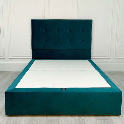 A glamorous gold square studded bed with buttoning detailing and luxury velvet upholstery 