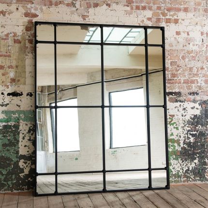Captivating window mirror with iron sectional details. 