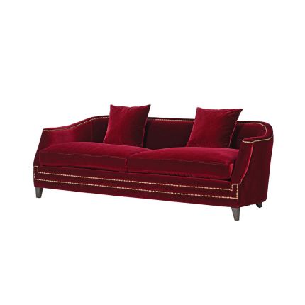 crimson red sofa with brass studding 