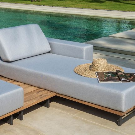 modern left chaise pictured in grey upholstery with teak wood base