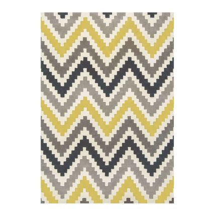 Hand-tufted wool rug with chevron pattern in yellow