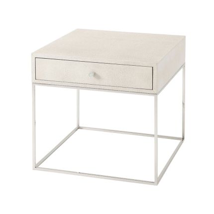A contemporary side table with a shagreen-embossed leather top and nickel base
