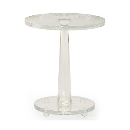 An elegant side table by Caracole with a contemporary clear glass design