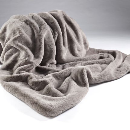 A luxurious soft grey faux fur throw with a faux suede silver grey reverse