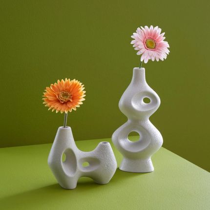 A sculptural vase by Jonathan Adler with soft curves