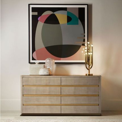 Neutral, modern chest of drawers with brass accents