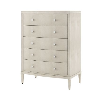 A gorgeous chest of drawers with a natural finish, embossed-shagreen leather-wrapped body and polished nickel detailing