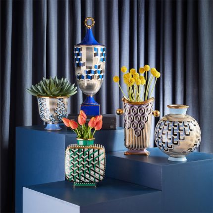 Enchanting cubist design bowls and vases with blue, indigo and gold tones