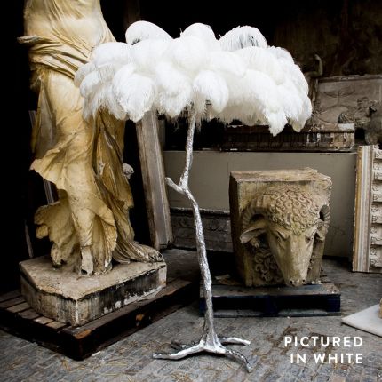 Modern, mini ostrich feather lamp with silver base