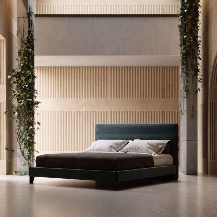 Luxury chic, art deco bed upholstered in a soft velvet