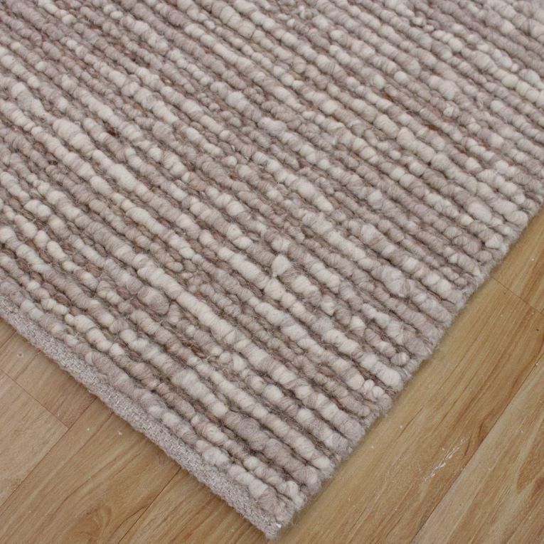 Hand woven wool rug in brown/beige shade