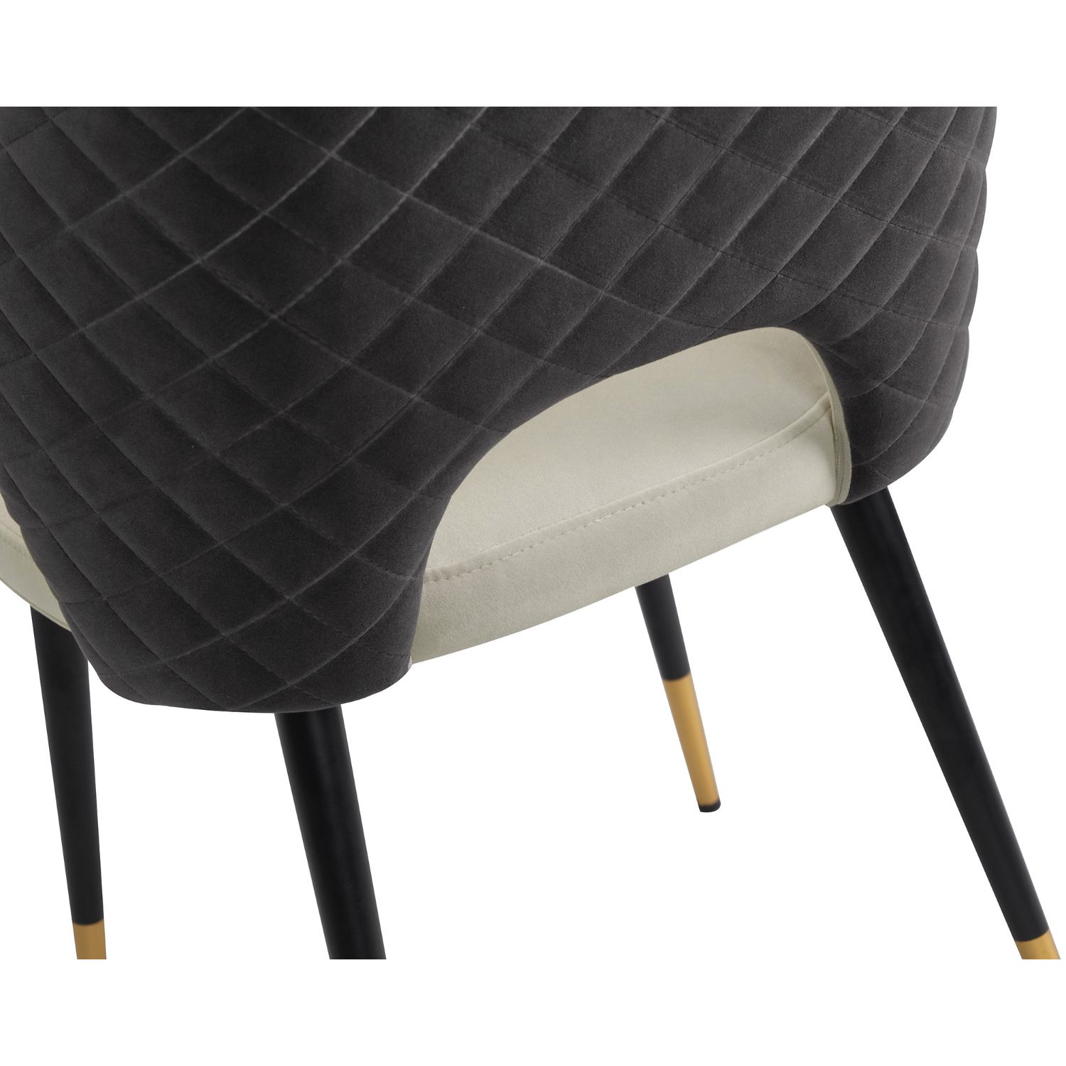 Elegant dining chairs with light grey velvet upholstery and quilted dark grey back