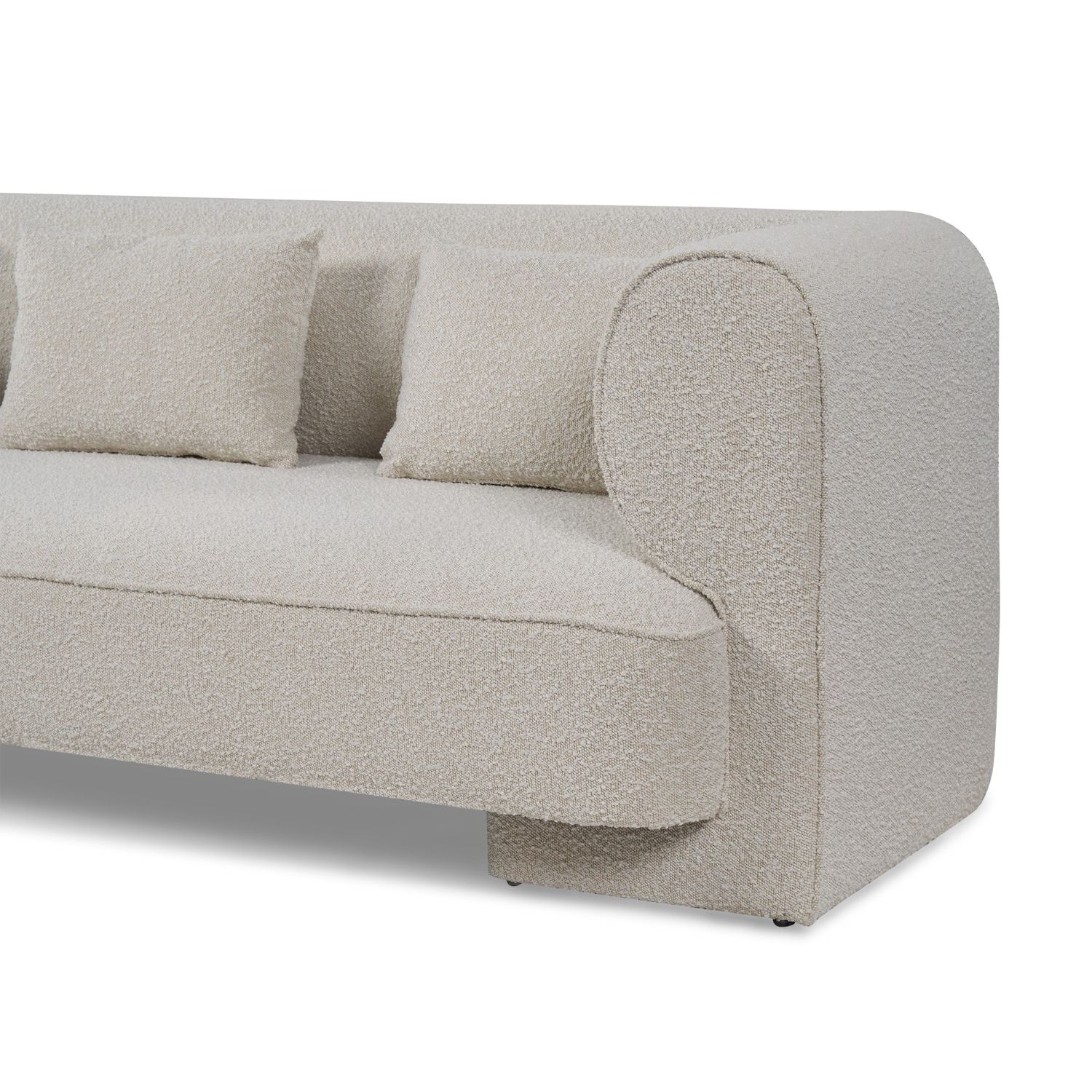 A sumptuous sofa with a beautiful boucle sand upholstery