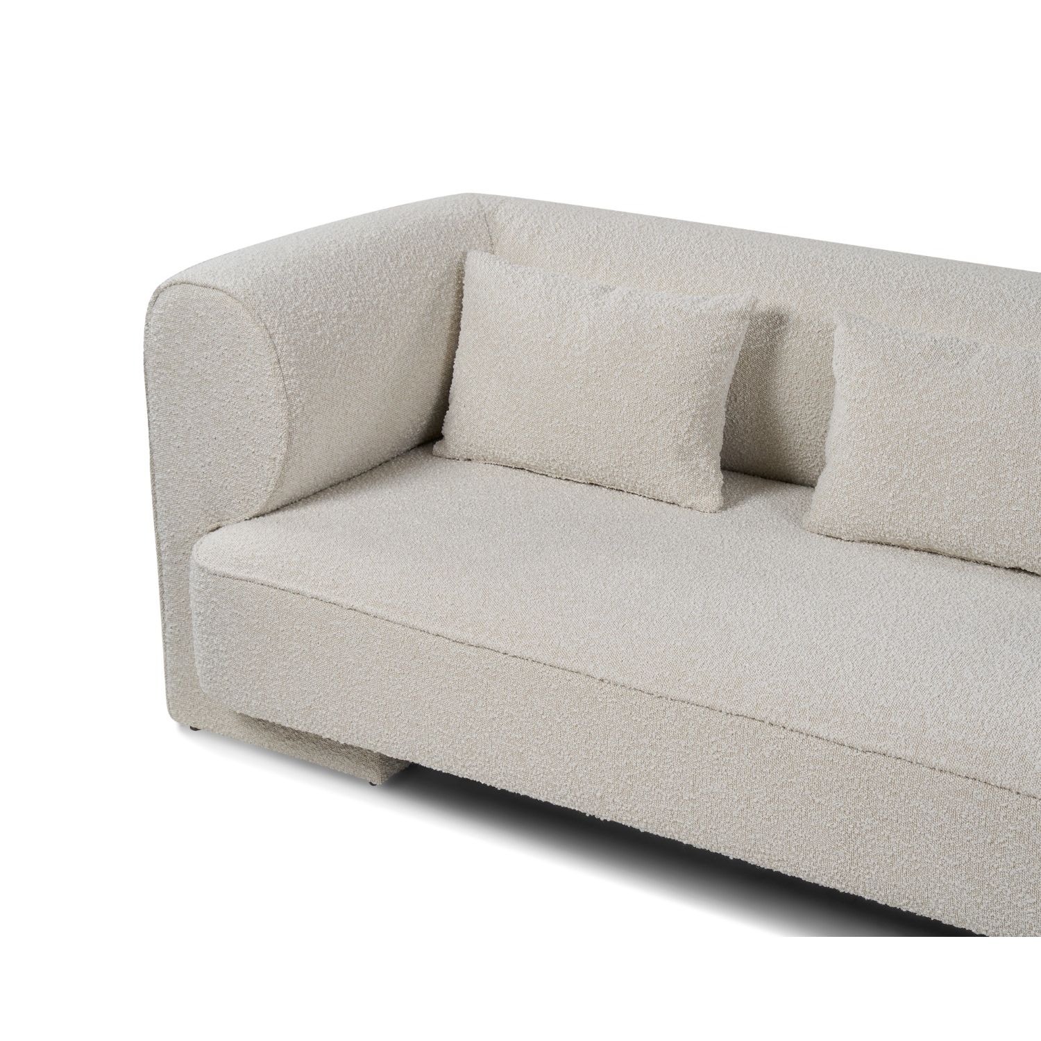 A sumptuous sofa with a beautiful boucle sand upholstery