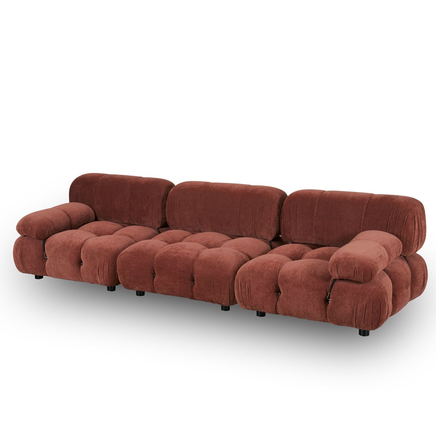 A statement modular sofa with a stylish rust upholstery and deep buttoned design