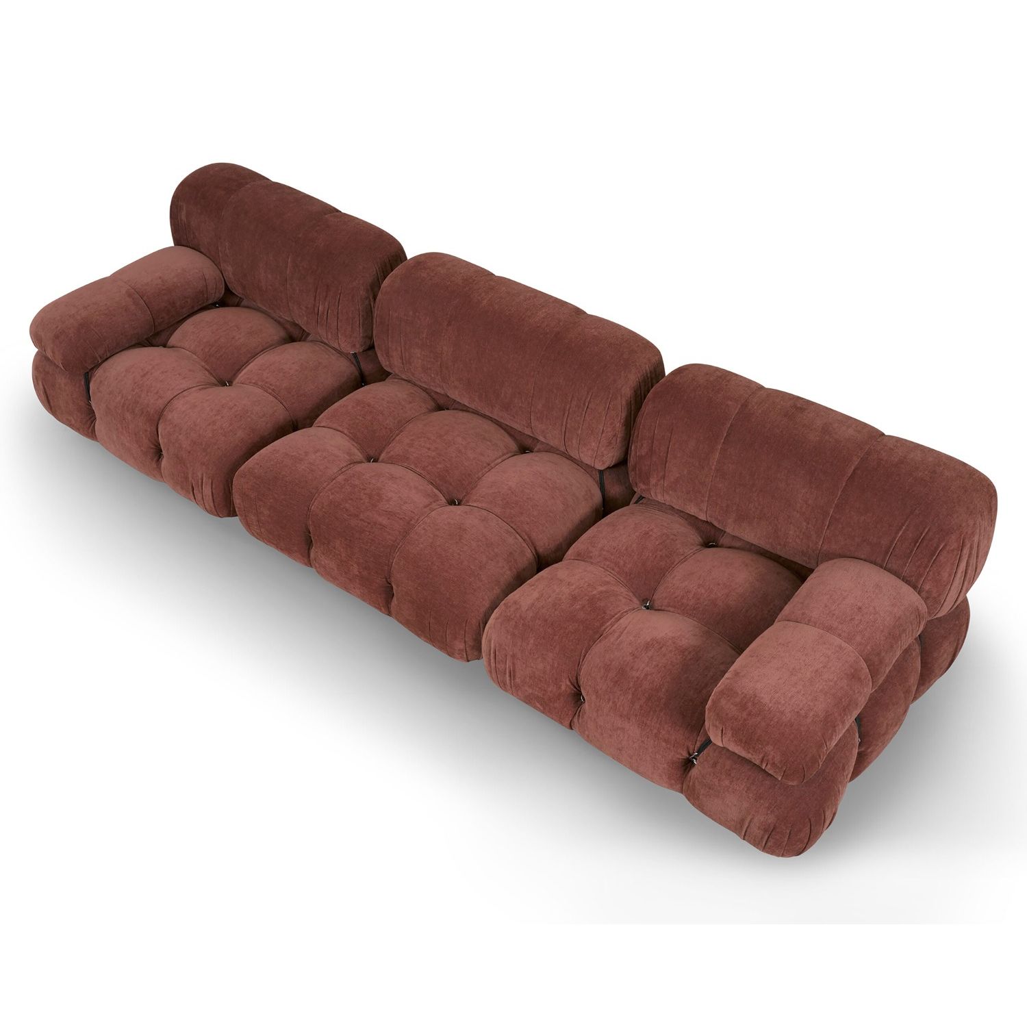 A statement modular sofa with a stylish rust upholstery and deep buttoned design