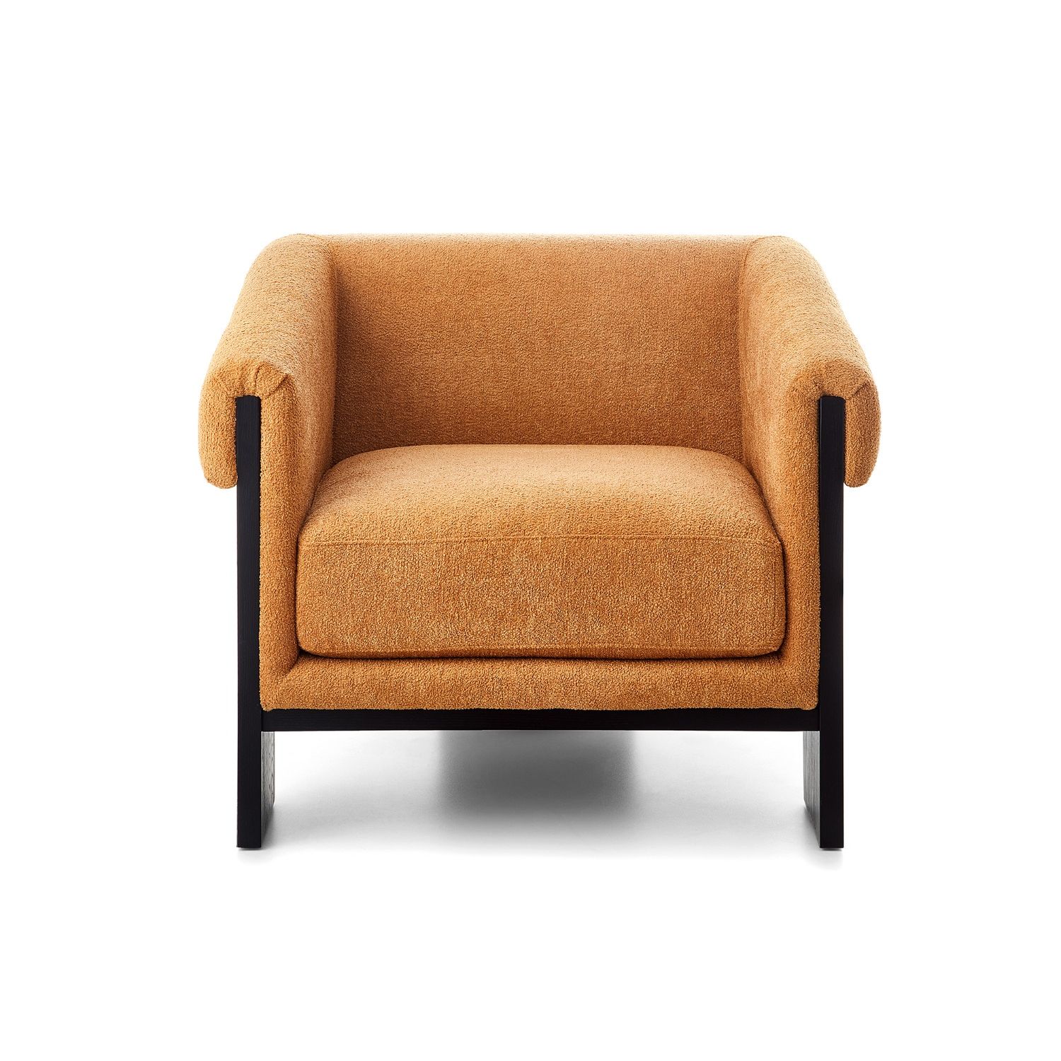 A statement armchair with a bright upholstery and black wood finish