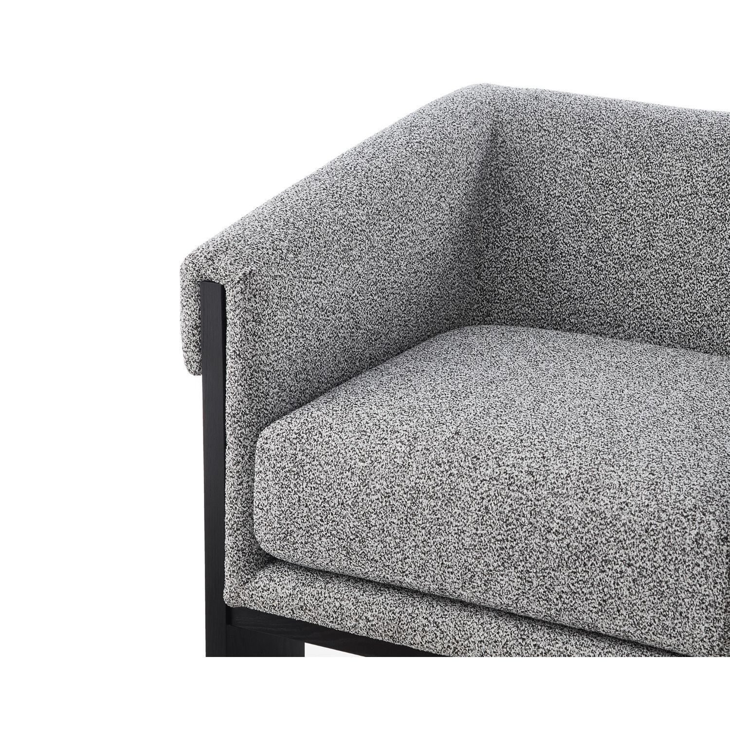 A contemporary chair with a gorgeous grey upholstery and black wood finish