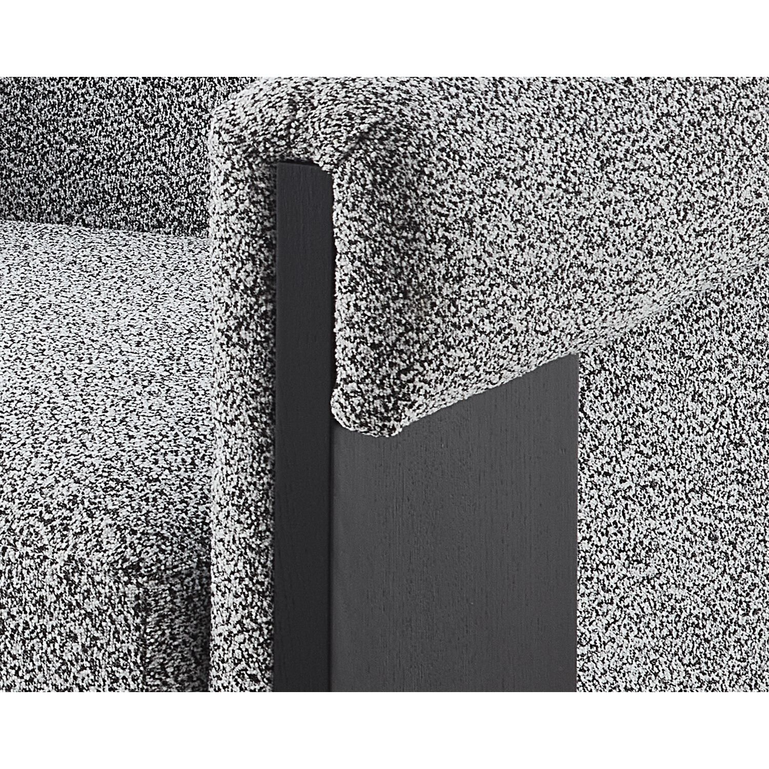 A contemporary chair with a gorgeous grey upholstery and black wood finish