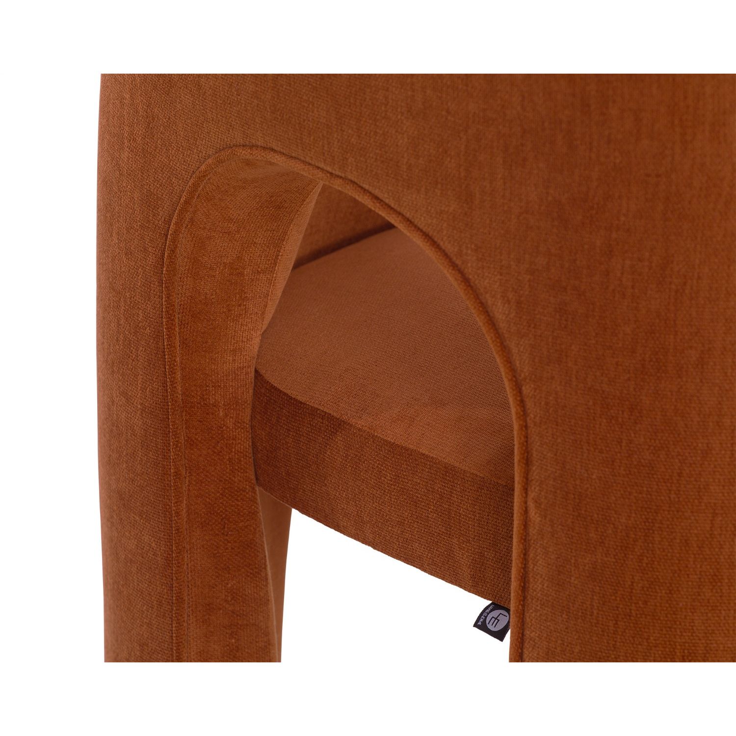 Arched dining chair completely upholstered in divine rust coloured fabric