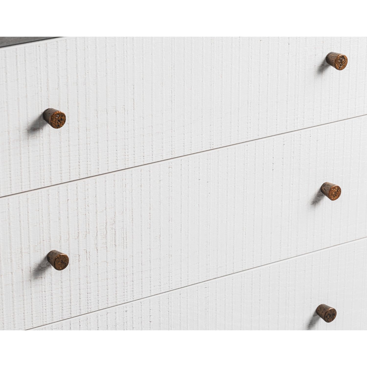 A luxury chest of drawers with a grey and white wood finish